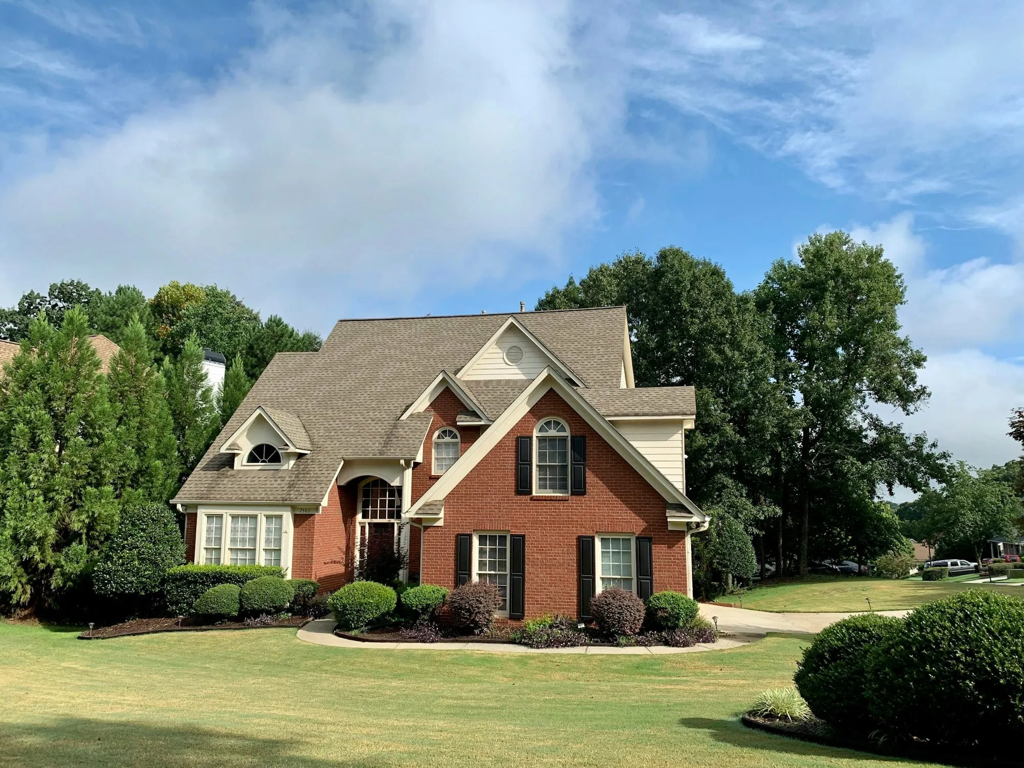 Brick home with a new shingle roof