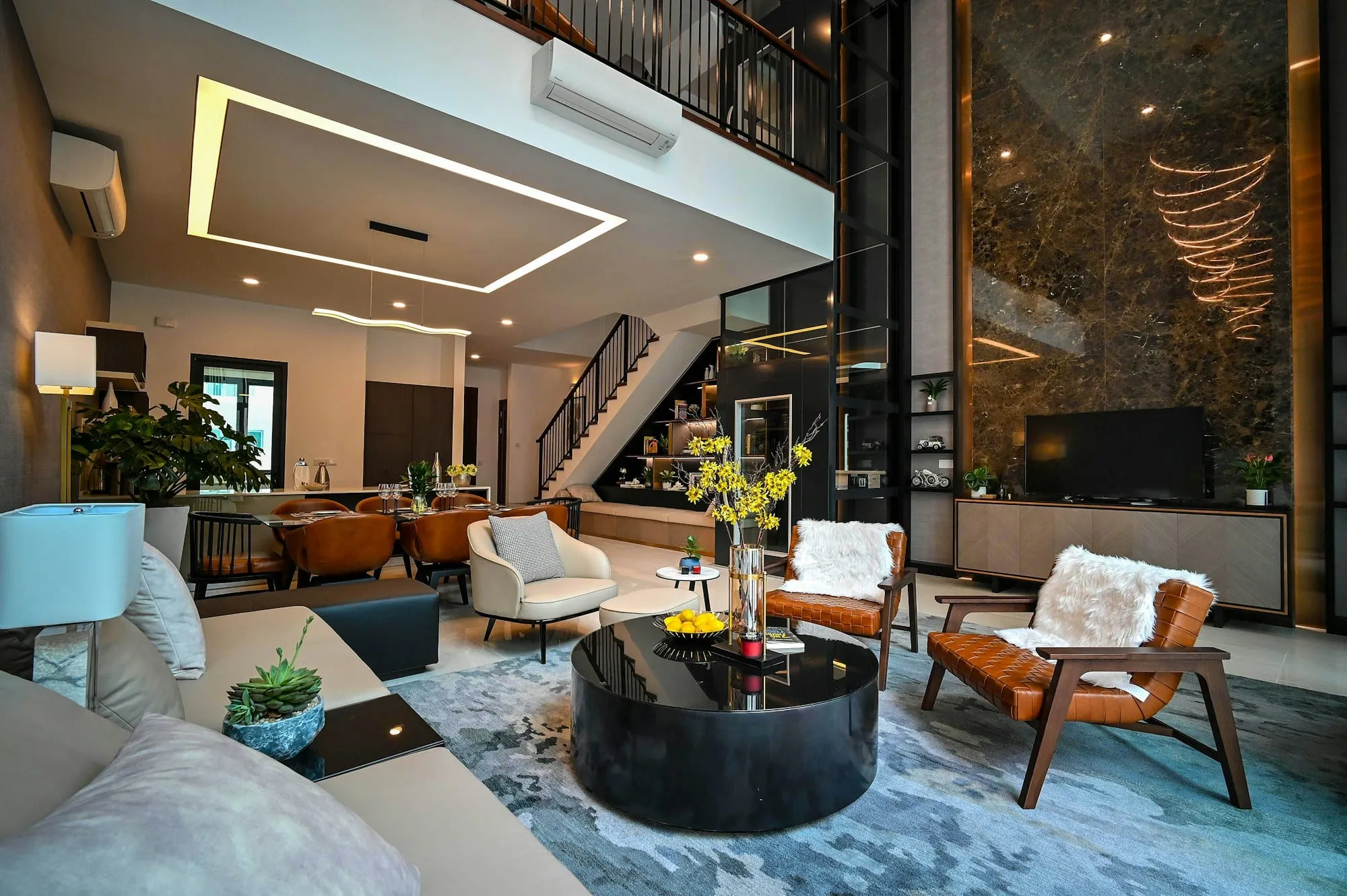 Finished open living space with feature lighting